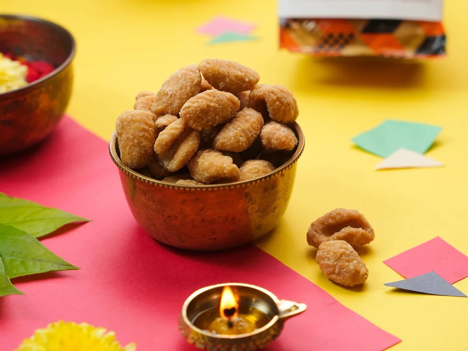 Bowl of bellam gavvalu, sweet shell-shaped bites