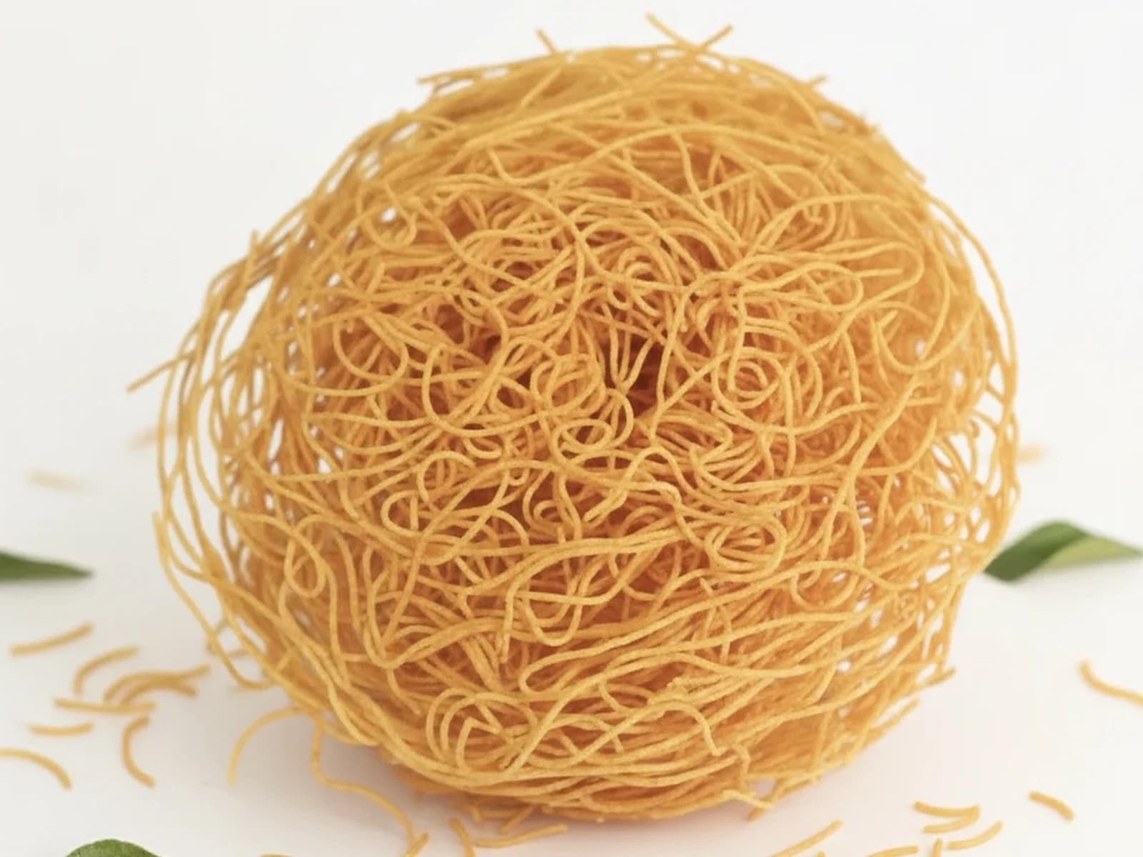 Nest of crispy vempusa, fine fried gram flour strands