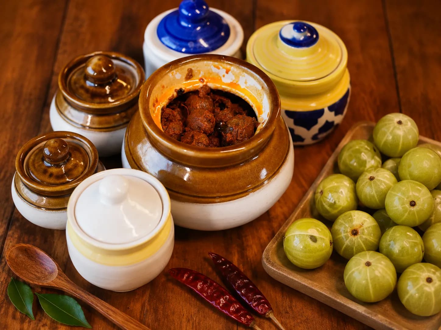 Jar of amla pickle made with fresh Indian gooseberries